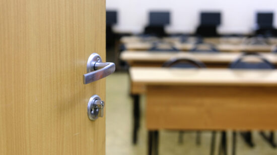 image of a half-open door to school class